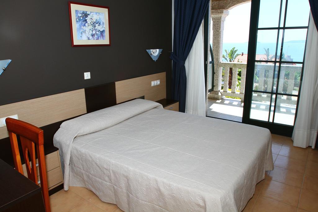 Apartamentos Coral Do Mar II Portonovo Habitación foto